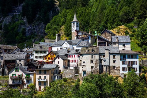 Characteristic old buildings in stone and wood in the village of Fusio