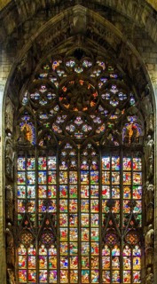 14th century Milan Cathedral stained glass windows in white marble
