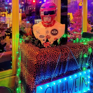 Neon-coloured nightlife in a pub on the Reeperbahn