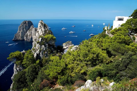 Rocky coast with boats on the sea