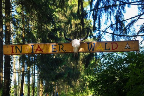 Wooden sign Indian forest in forest ropes course