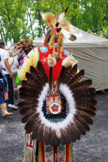 Indian with colorful dress at a Pow Wow