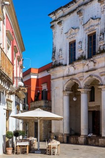 Piazza Salandra with ice cream cafe in front of Palazzo della Pretura