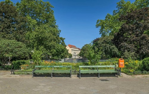 Two empty park benches