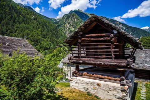 Characteristic old buildings in stone and wood in the hamlet of Mogno
