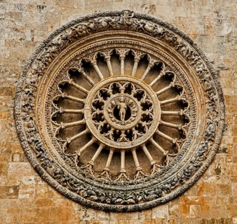 Grandiose rose window of the cathedral Santa Maria Assunta from the 15th century Ostuni