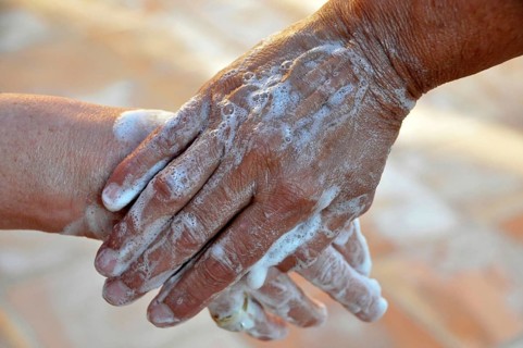 Two soapy hands