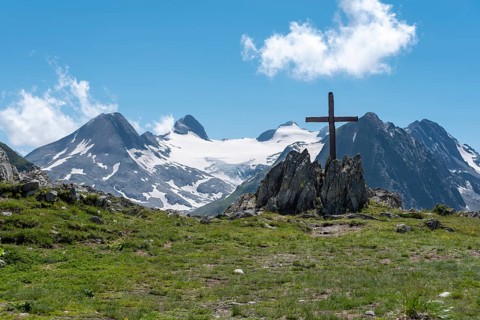 Nufenen Cross in Alpine Landscape near Nufenen Pass