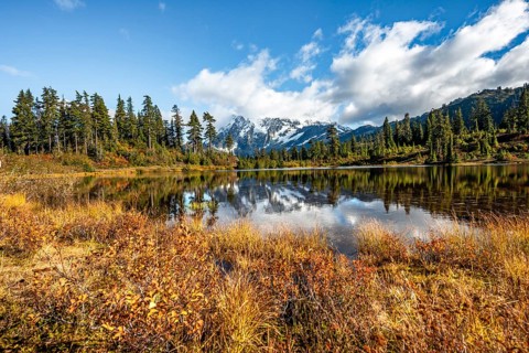 Mt. Shuksan glacier with snow reflecting in Picture Lake