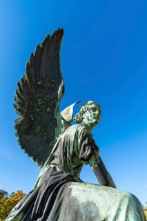 Bronze angel in front of the Orangery Palace in Sanssouci Park