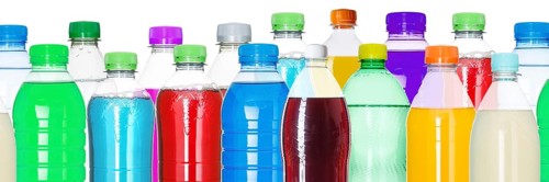 Bottles with colourful drinks