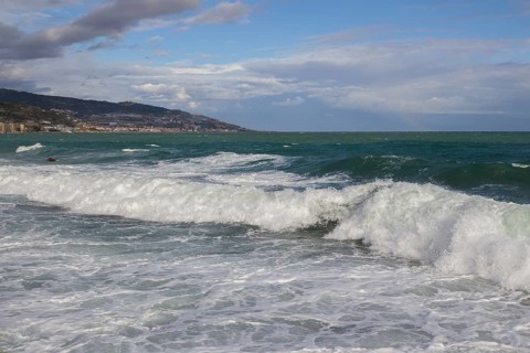 Strong swells during storm break on seawall in Sanremo