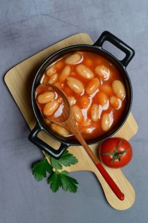 White beans with tomato sauce in pots