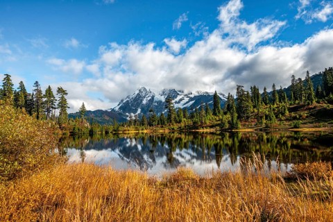 Mt. Shuksan glacier with snow reflecting in Picture Lake