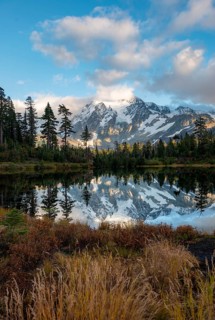 Mt. Shuksan glacier with snow reflecting in Picture Lake