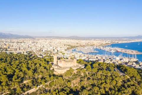 Castell de Bellver castle with harbour holiday travel aerial view in Palma de Majorca