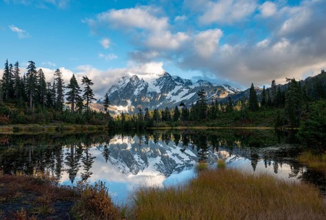 Mt. Shuksan glacier with snow reflecting in Picture Lake