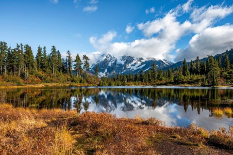 Mt. Shuksan glacier with snow reflecting in Picture Lake