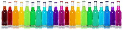 Bottles with colourful drinks