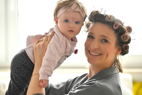 Mother with curlers in her hair