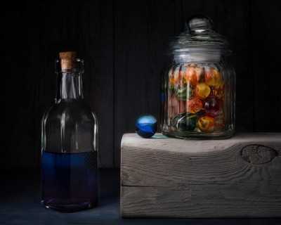 Still life with glass bottle