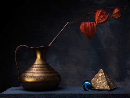 Still life with gilded pyramid