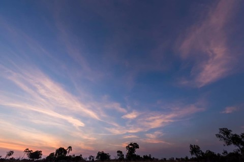 Coloured veil clouds over the Okavango Delta