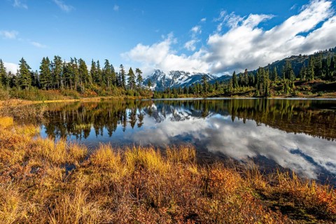 Mt. Shuksan glacier with snow reflecting in Picture Lake