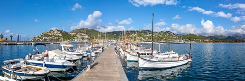 Marina harbour with boats holiday travel town on Majorca panorama in Port d'Andratx