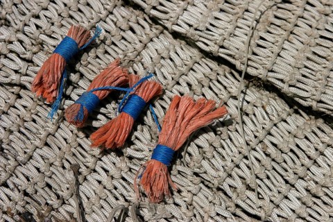 Fishing net with red stoppers