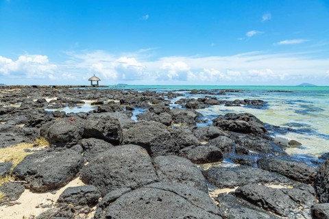 Rocky beach of Grand Gaube in the North of the republic of Mauritius