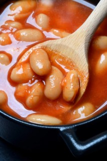 White beans with tomato sauce in pots