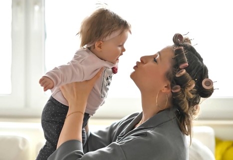Mother with curlers in her hair