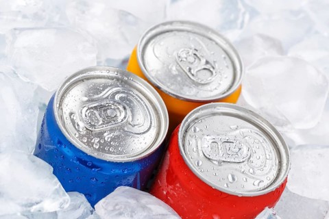 Beverages Lemonade Cola Soft drinks in cans Beverage cans on ice cube Ice cubes in