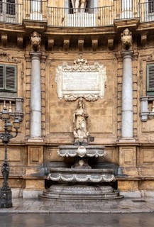 Fountain representing winter season at Quattro Canti