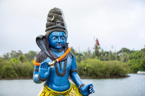 Statue of Lord Shiva at the sacred lake of Ganga Talao in the south of the island of Mauritius