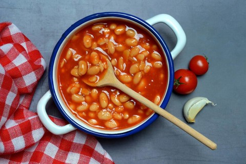 White beans with tomato sauce in pot