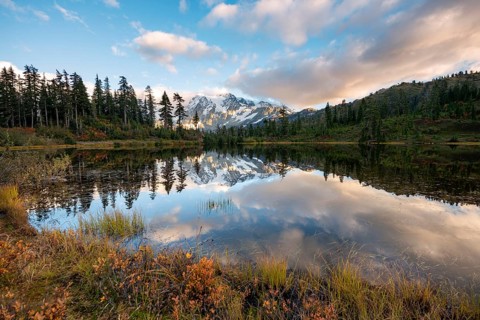 Mt. Shuksan glacier with snow reflecting in Picture Lake