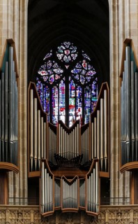 Church window by Hans Gottfried von Stockhausen above the main organ in Ulm Cathedral