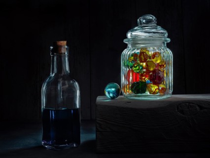 Still life with glass bottle