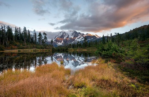 Mt. Shuksan glacier with snow reflecting in Picture Lake