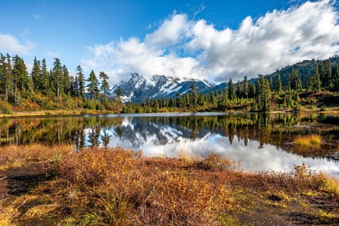 Mt. Shuksan glacier with snow reflecting in Picture Lake