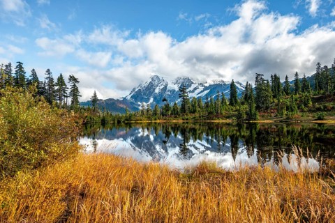 Mt. Shuksan glacier with snow reflecting in Picture Lake