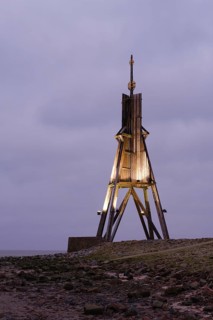 Illuminated Kugelbake at blue hour