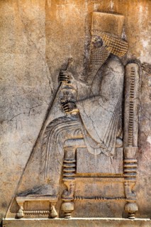 Relief of King Darius enthroned under a canopy