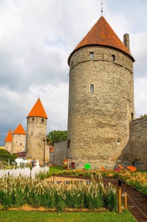 Medieval city fortification with battlements and defence towers