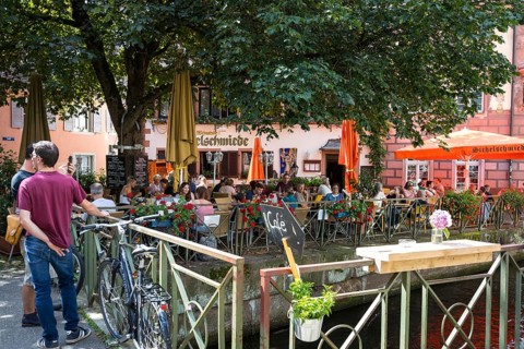 Restaurant with outdoor seating on the island on the Gewerbekanal