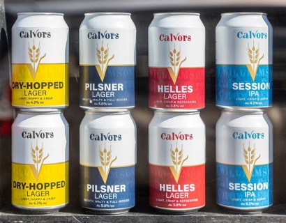 Shop window display of Calvors beer and lager cans