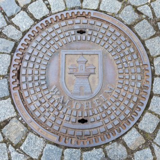 Manhole cover with coat of arms of Waldheim