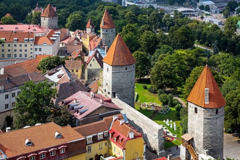 Medieval city fortification with battlements and defence towers